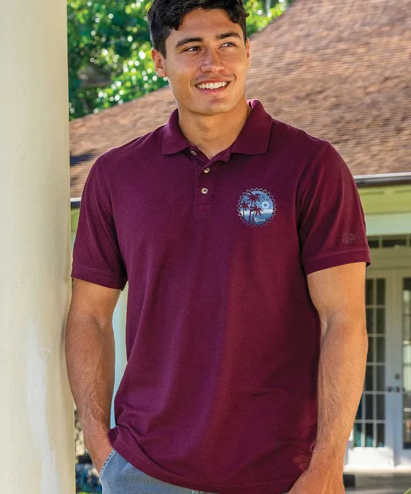 Polos>Crazy Shirts Sunset Scenic Circle - Fig Dyed Short Sleeve Oceanfront Polo Shirt